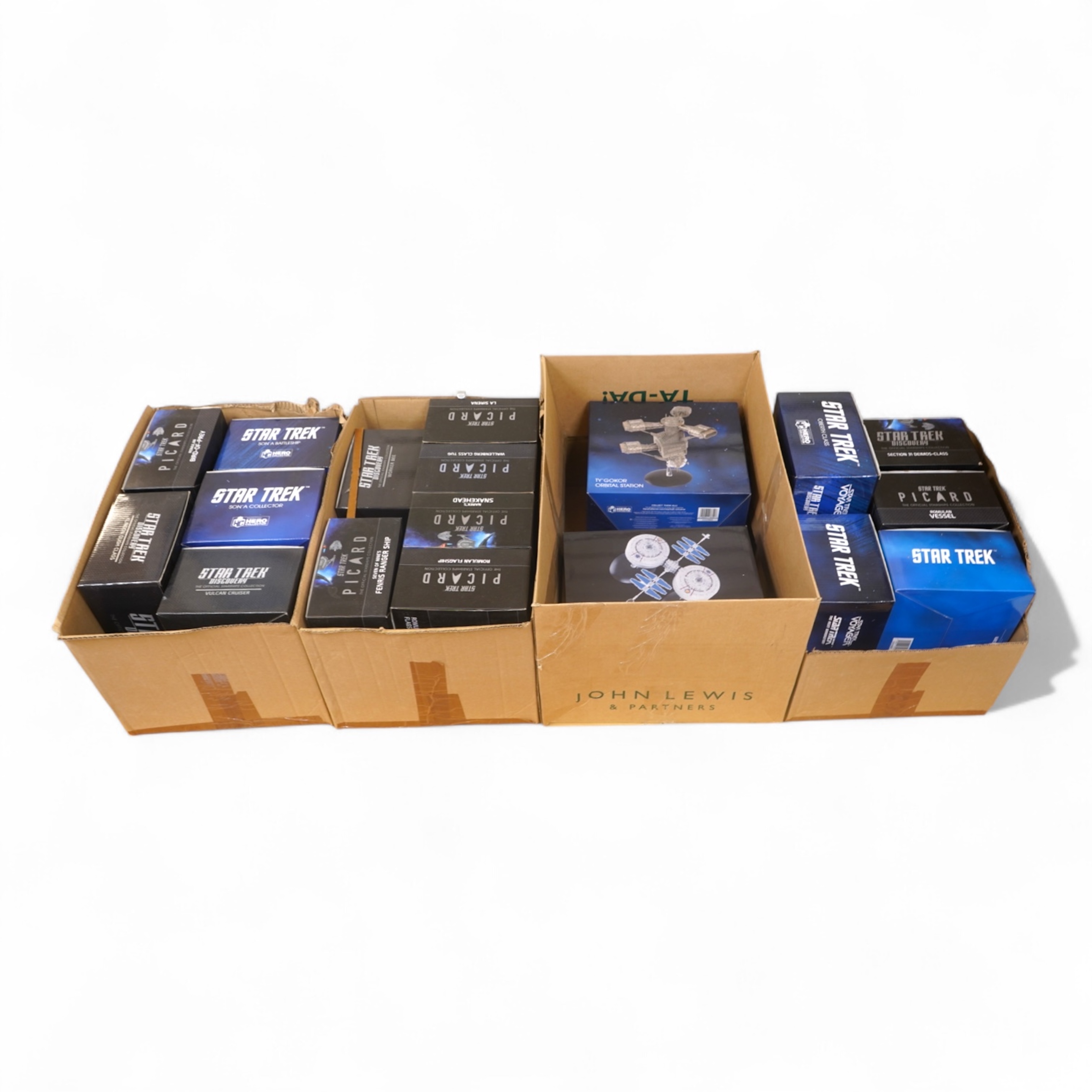 Eighteen boxed Eaglemoss Star Trek magazine issue models, including; a Vulcan Cruiser, a Klingon Qugh Class vessel, a Son’a Battleship, a Romulan Flagship, Jupiter Station, Ty’Gokor Orbital Station, etc. Condition - good